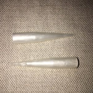 Creamy pearl colored size zero stretchers